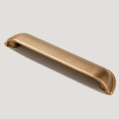 Plank Hardware Cabinetry ALBANY Cup Pull - Aged Brass